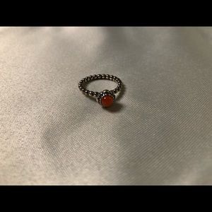 Pandora ring with orange stone
